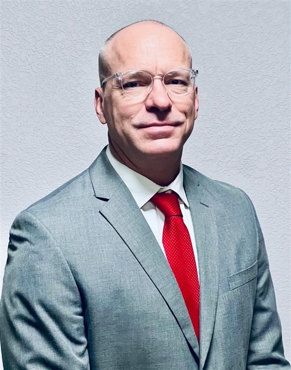 Dr. Chris Brattain